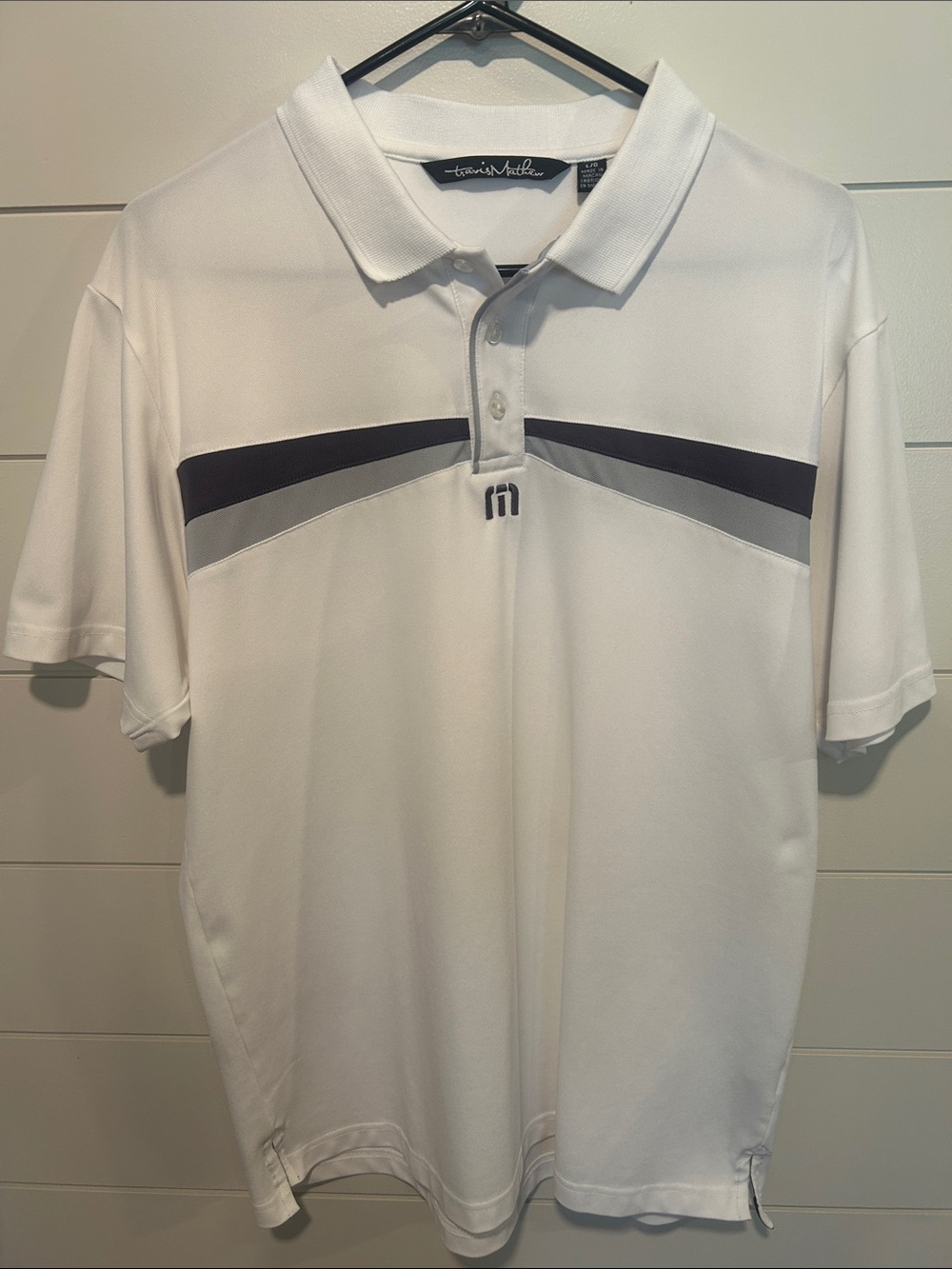 Travis Mathew White Polo with Purple and Gray Chevron Accents